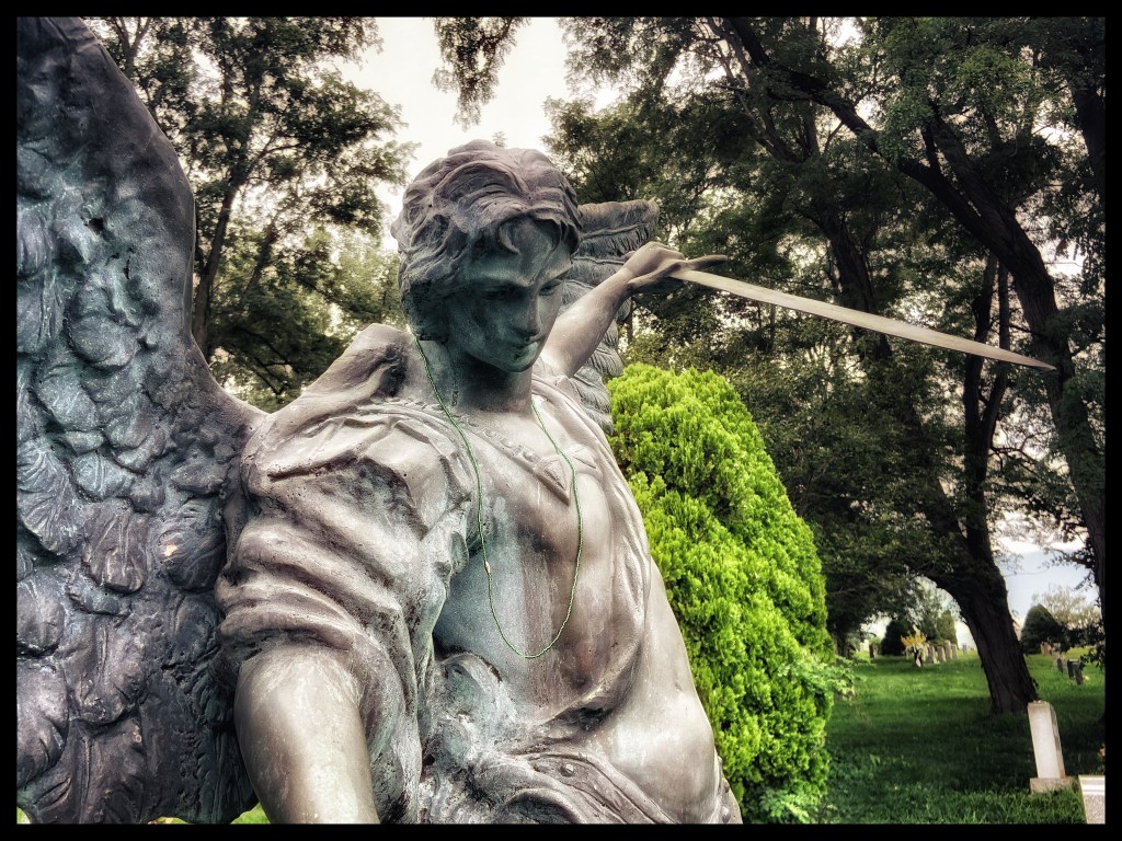 Photo by Galina Krasskova of Saint Michael statue from Calvary Cemetery in Newburgh, New York. 