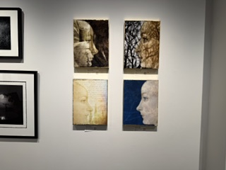 Four framed artworks depicting profile silhouettes of faces, displayed in a gallery setting, with two pieces at the top and two at the bottom.